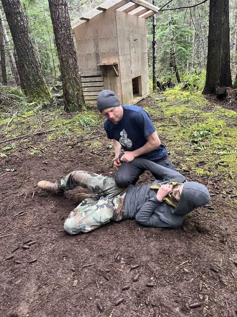 Partners practising on the forest floor